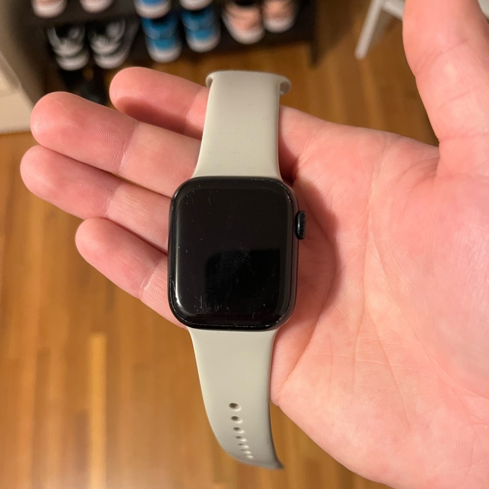 Apple Watch Series 7 41 mm with watch band, box, and charger cable